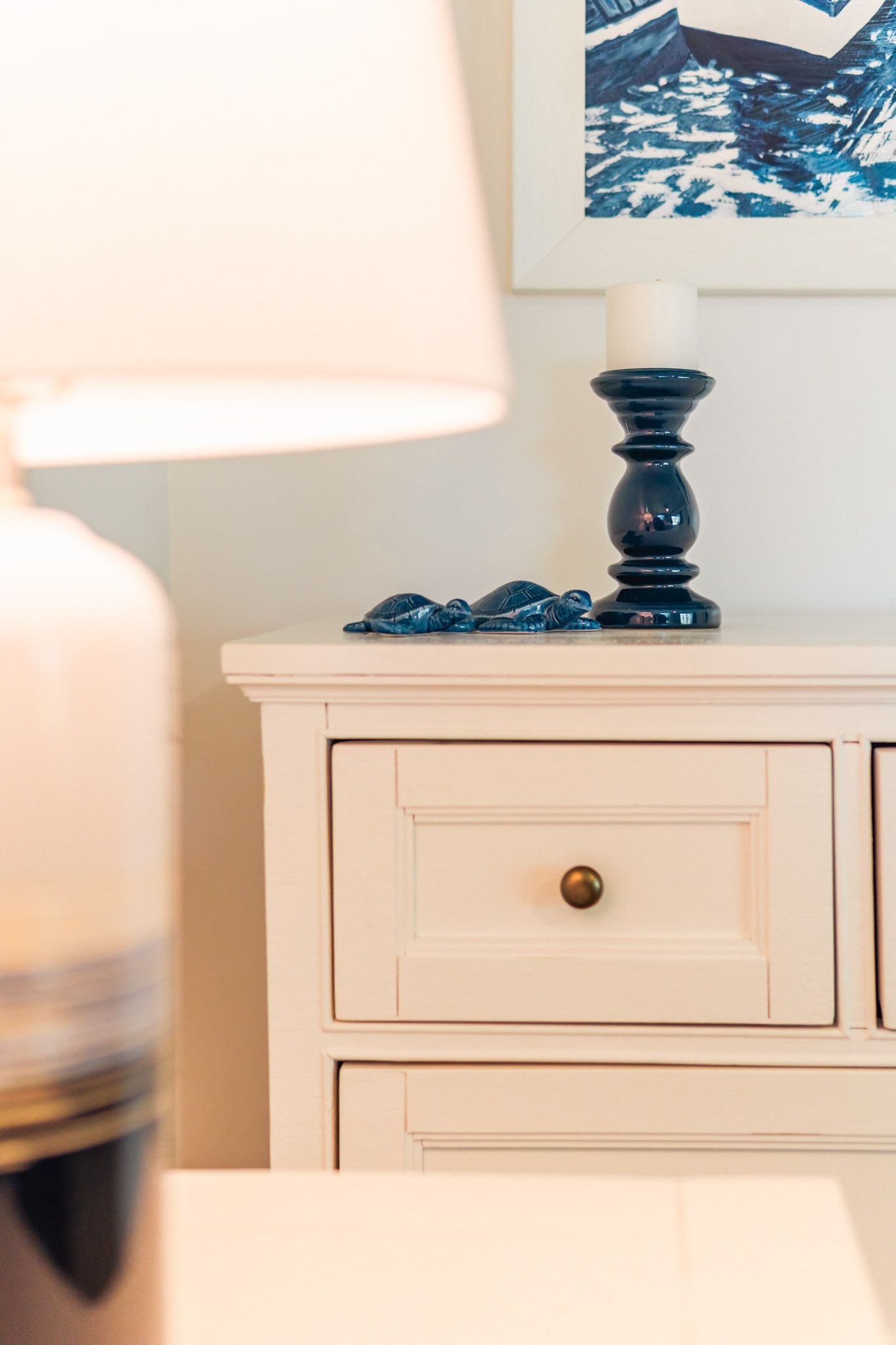 Master bedroom detail with coastal decor.