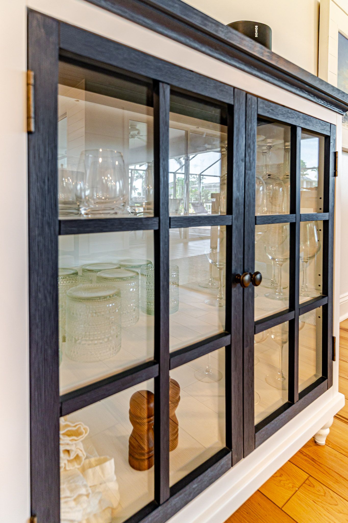 Kitchen pass-through to outdoor dining.