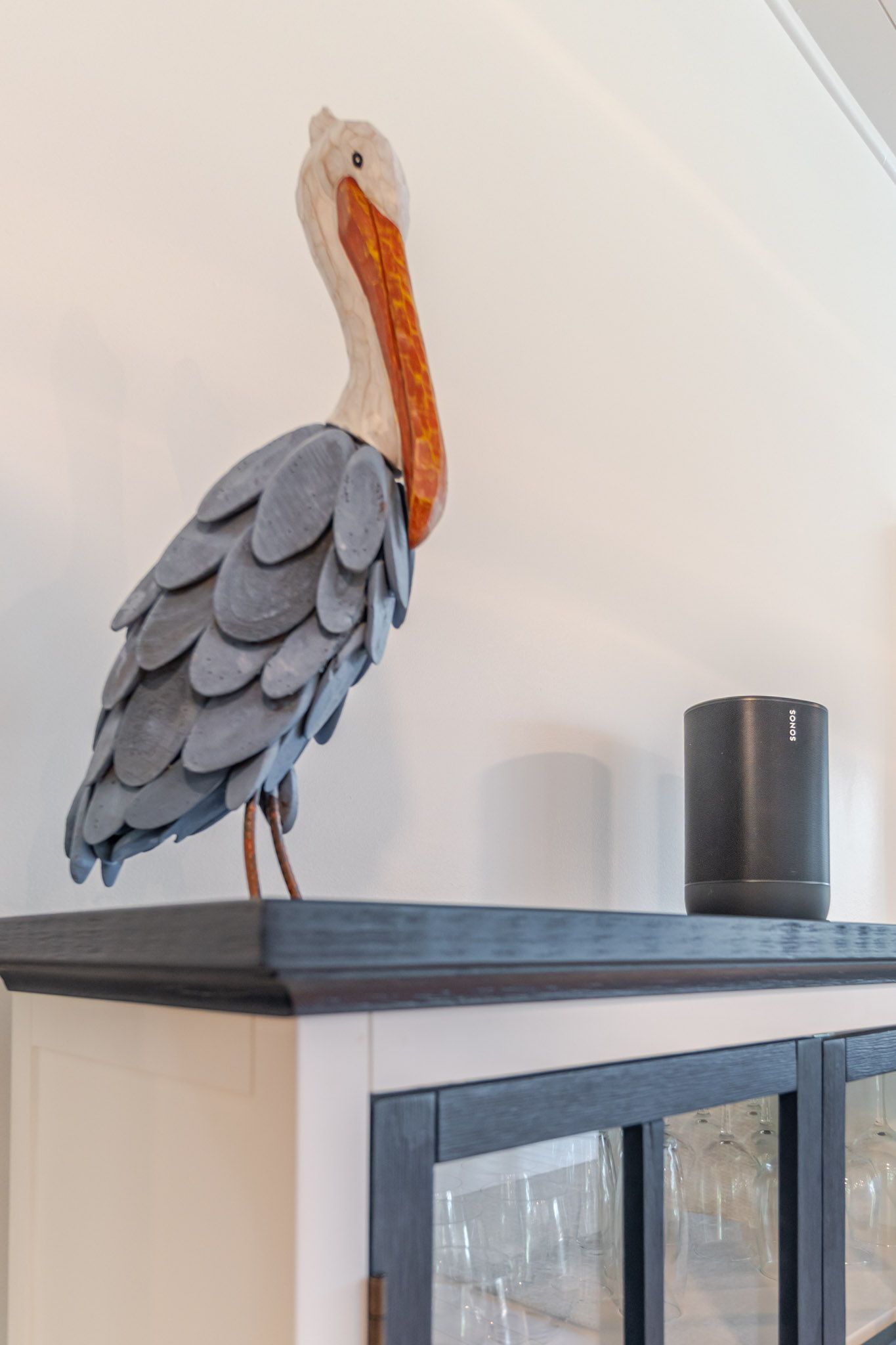 Kitchen detail with cookware and open shelving.