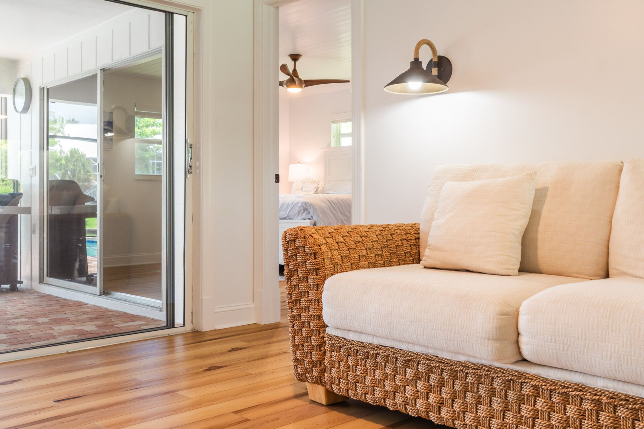Living area with vaulted ceilings and natural light.