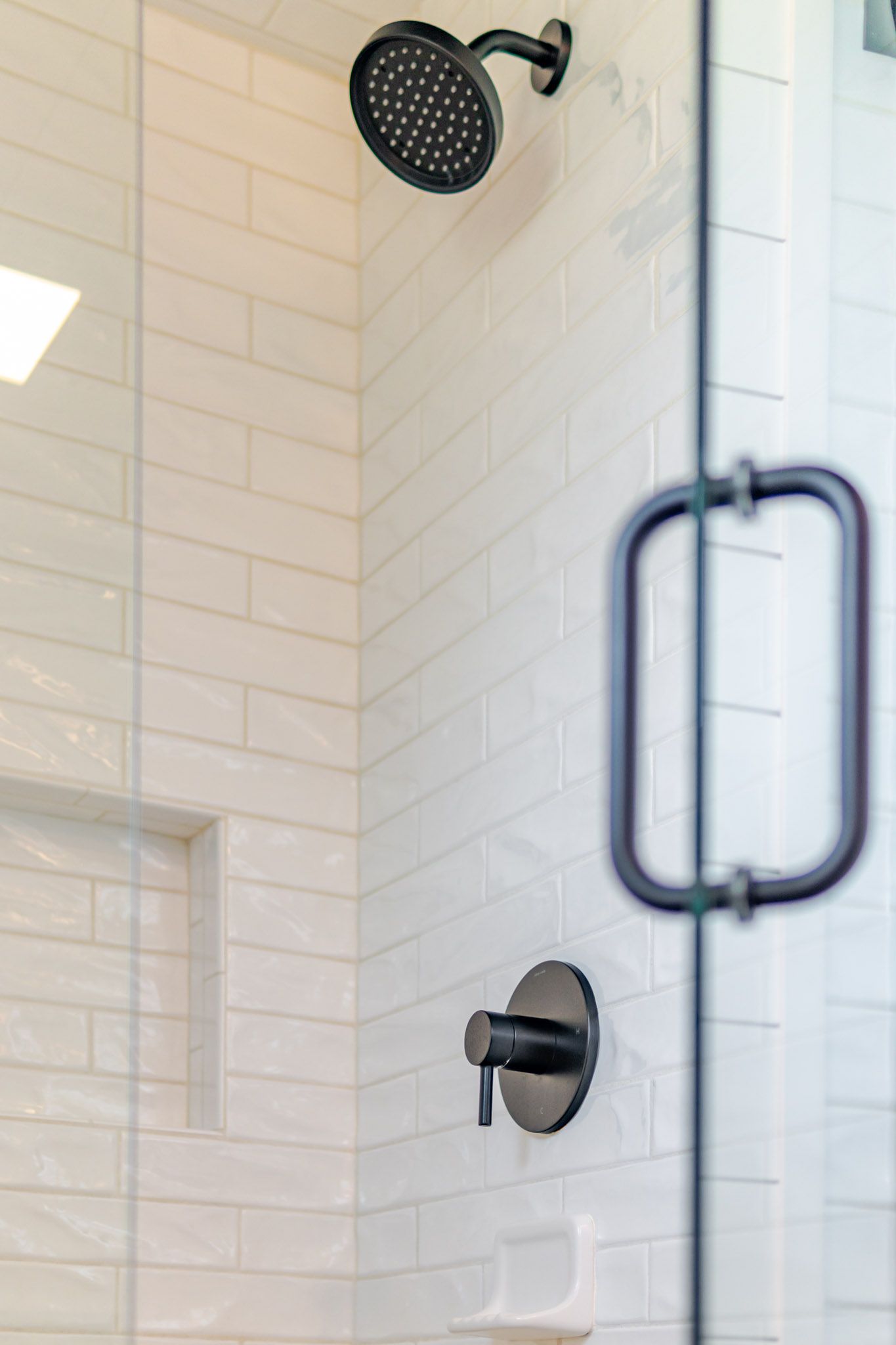Master bathroom detail with modern fixtures.