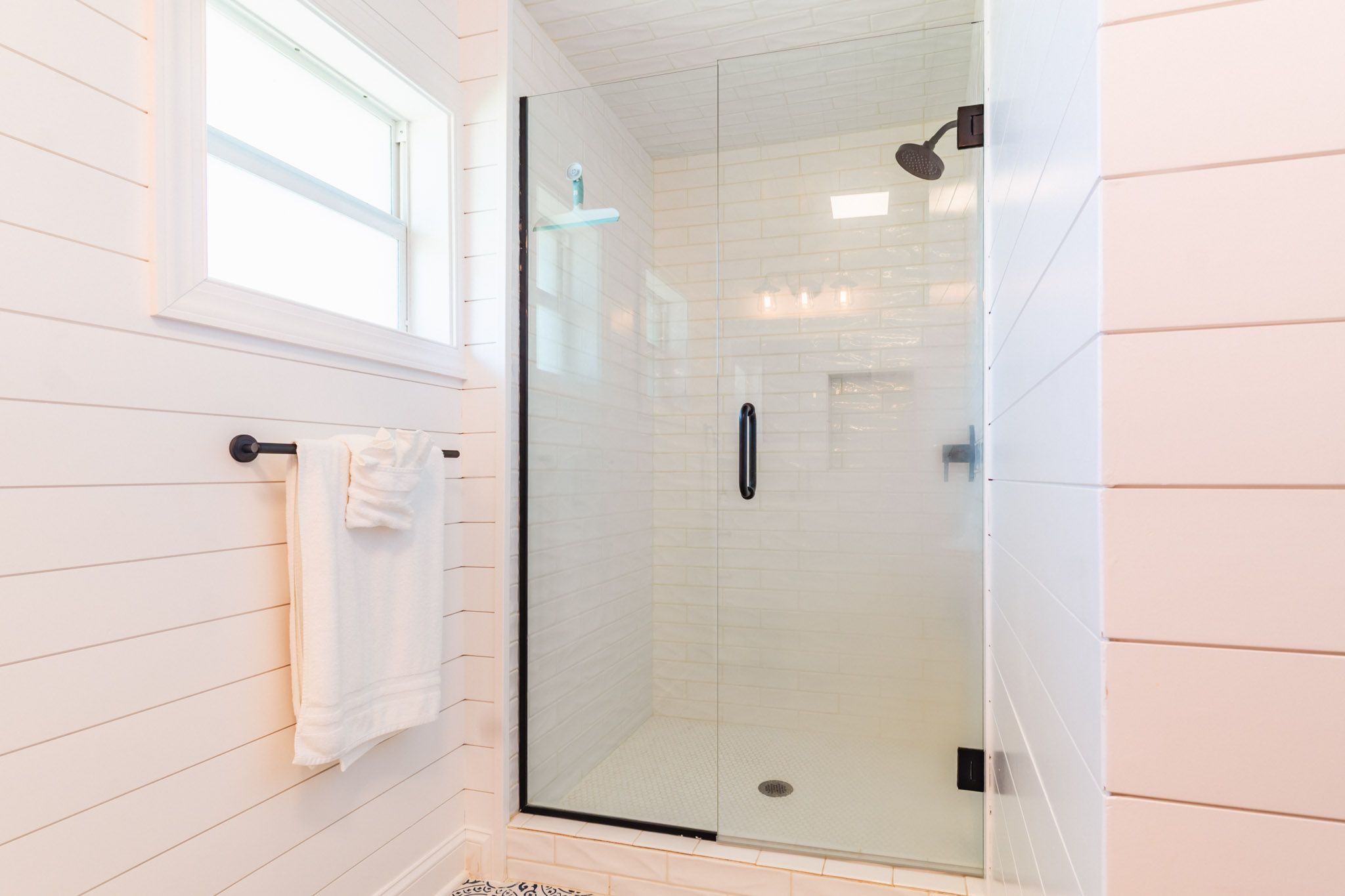 Guest bathroom with shiplap walls.